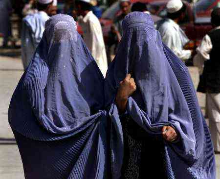 Women in Afghanistan today, enslaved and forced to wear full length burqas.